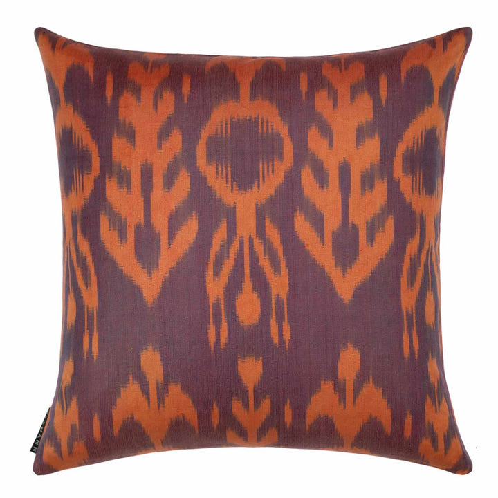 Back view of Mekhann's multicoloured pomegranates tree embroidered cushion, revealing a full view of the orange and purple back lining.