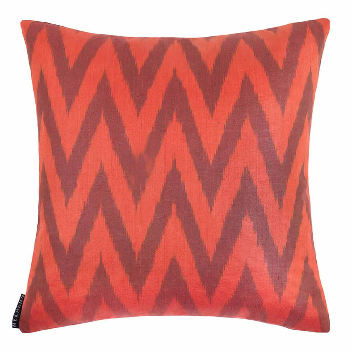 Back view of Mekhann's red and black iznik embroidered cushion, revealing a red and maroon zig zag back lining.