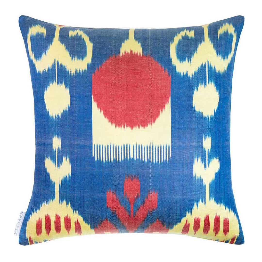 Back view of Mekhann's cream abstract Topkapi embroidered cushion, showing the blue, red and cream ikat back lining.