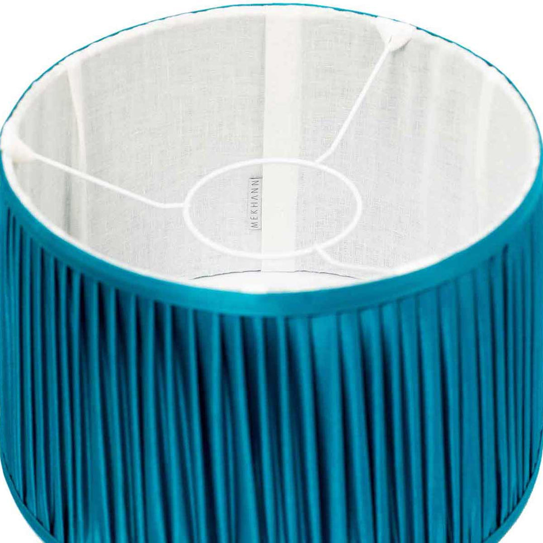 Interior perspective of Mekhann's handcrafted blue silk lampshade, highlighting the fine silk texture and quality craftsmanship.