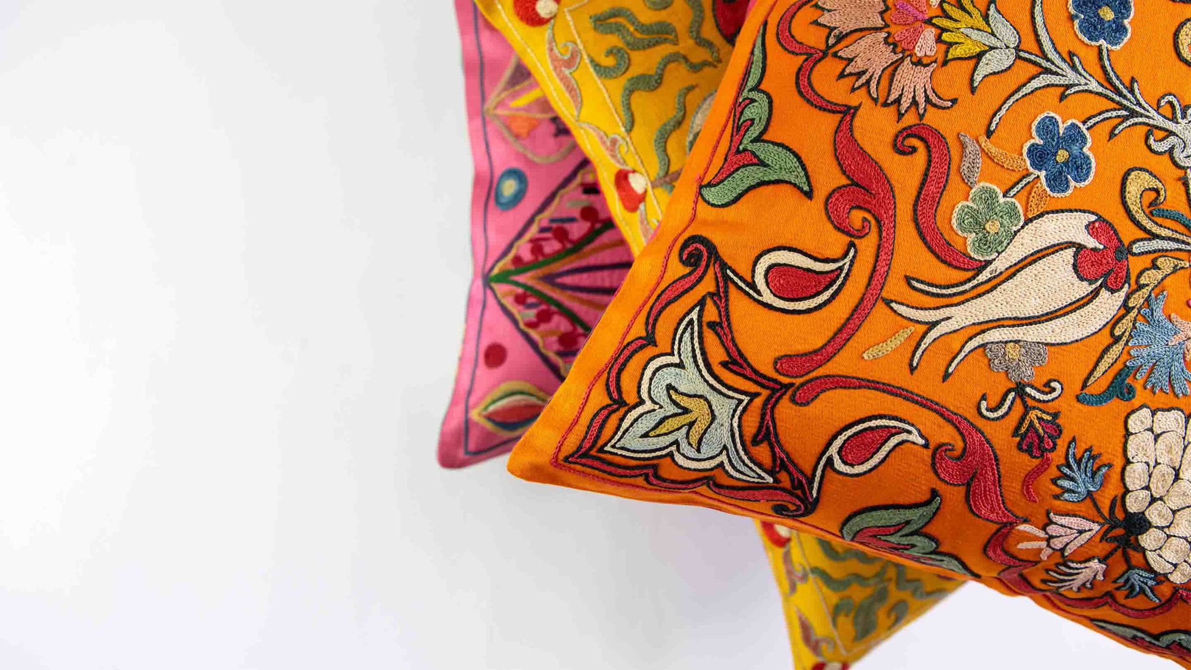 Colorful mekhann cushions beautifully present with white background