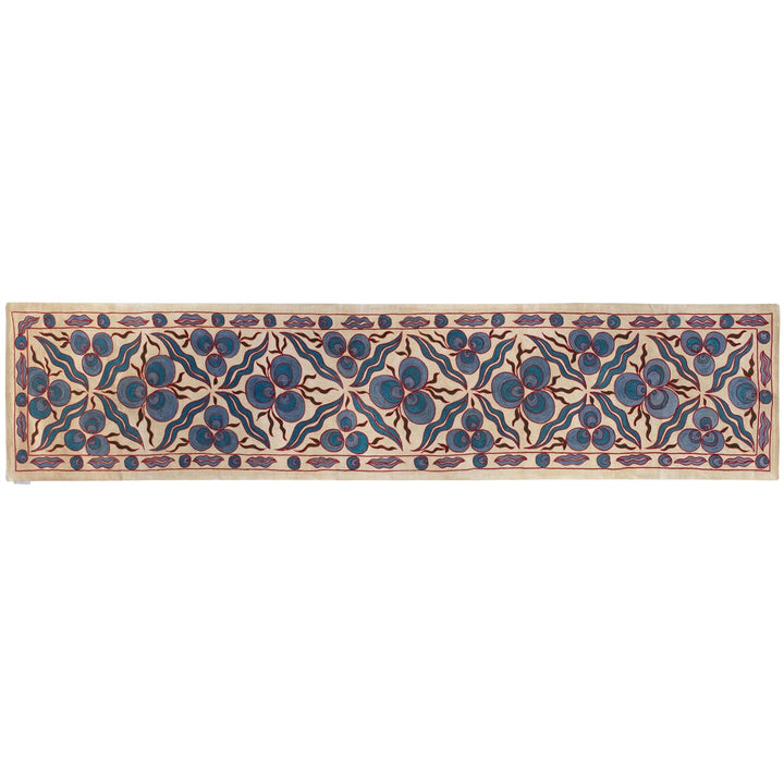 Horizontal view of Mekhann's cream cintamani runner, showing an alternative way you can use the runner or view the runner to help you image it in your home.