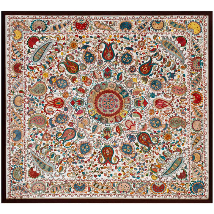 Horizontal front view of cream silk, multicoloured embroidered framed artwork, giving an alternative suggestion to how to position the frame.