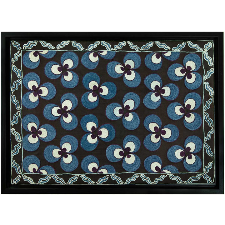 Horizontal front view of Mekhann's hand embroidered black silk cintamani artwork, revealing an alternative way of viewing the silk artwork, giving the viewer different placement ideas.