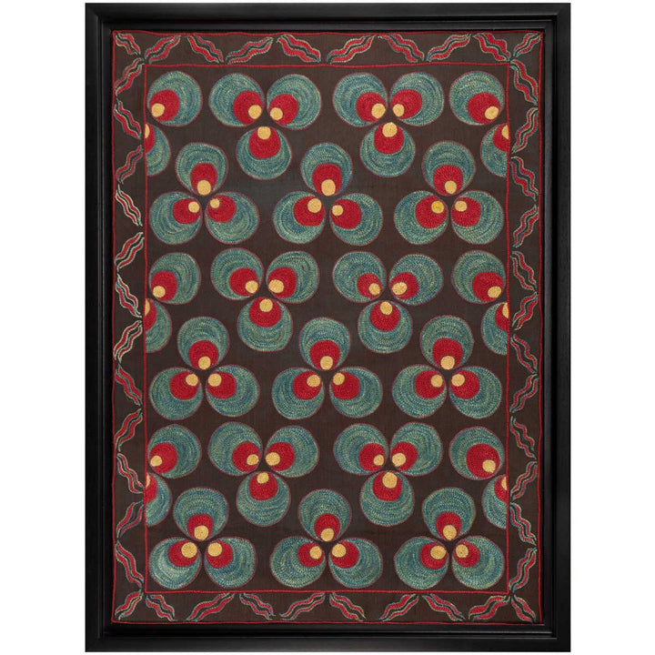 Front view of Mekhann's black silk, with red and blue cintamani patterns hand embroidered artwork. Showing in full the embroidered blue, red and light yellow Cintamani patterns all set against a black silk base.