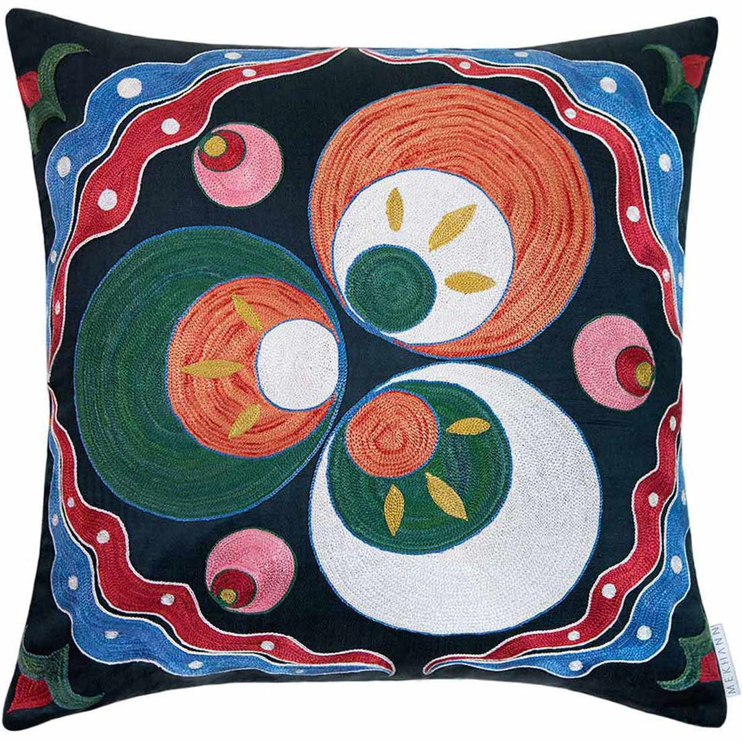 Back view of Mekhann's black and green Cintamani embroidered cushion, here we can see the three main Cintamani circle patterns that are surrounded by a collection of abstract patterns that have all been hand embroidered on a navy coloured silk base.