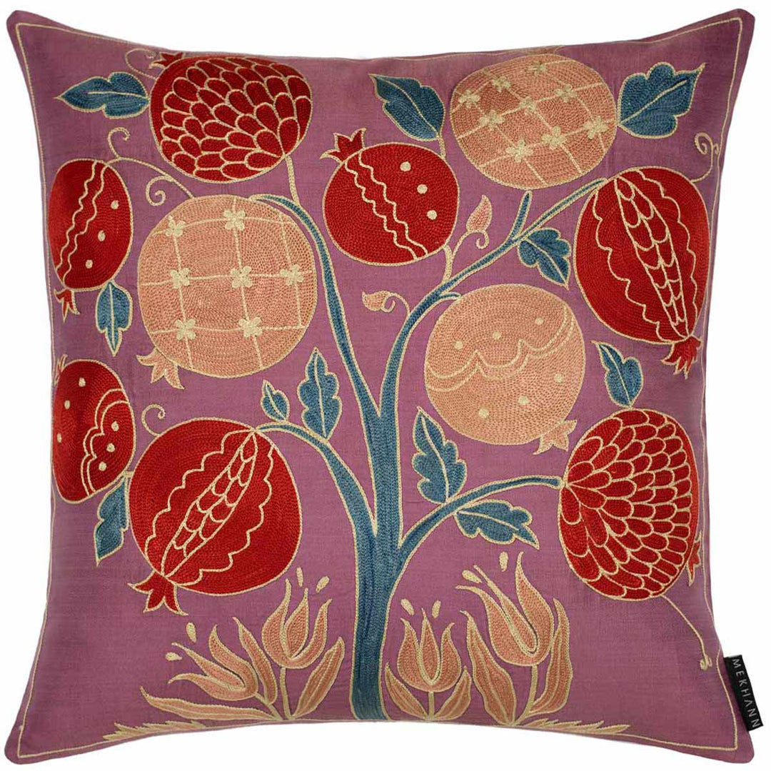 Front view of Mekhann's  multicoloured pomegranates tree  embroidered cushion, revealing the full composition of hand embroidered red, light orange and teal pomegranate tree, all hand embroidered onto a purple silk base.