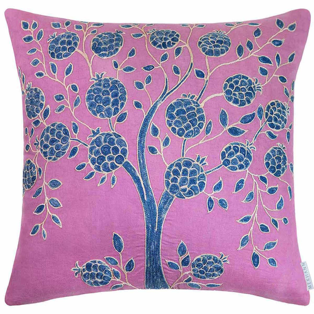 Front view of Mekhann's multicoloured pomegranate embroidered cushion, showing hand embroidered blue and cream pomegranates onto a purple silk base.