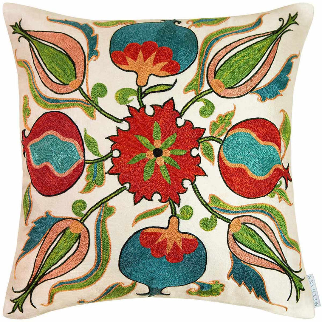 Front view of Mekhann's multicoloured Pomegranates and Tulips embroidered cushion. Revealing the full composition of the silk embroidered cushion, where the tulip and pomegranate design motifs can be seen in full.