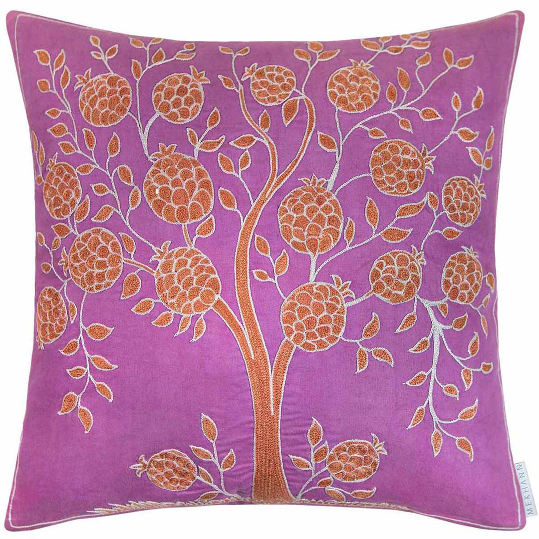 Front view of Mekhann's purple pomegranate embroidered cushion, revealing a composition of hand embroidered beige and cream pomegranates onto a purple silk base.