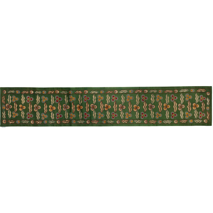 Horizontal front view of Mekhann's green cintamani runner, showing an alternative way you can use the runner or view the runner to help you image it in your home.