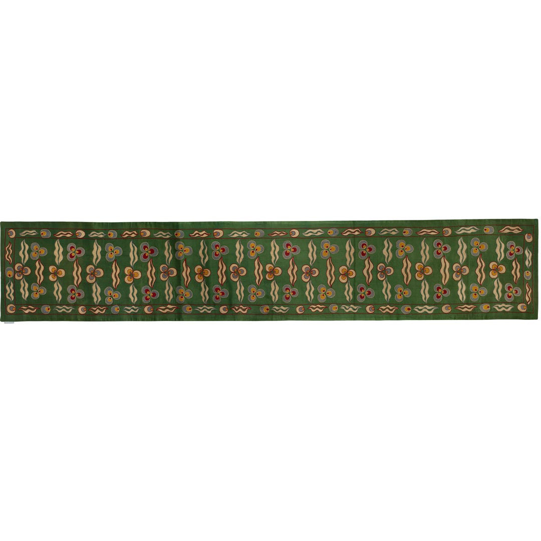 Horizontal front view of Mekhann's green cintamani runner, showing an alternative way you can use the runner or view the runner to help you image it in your home.