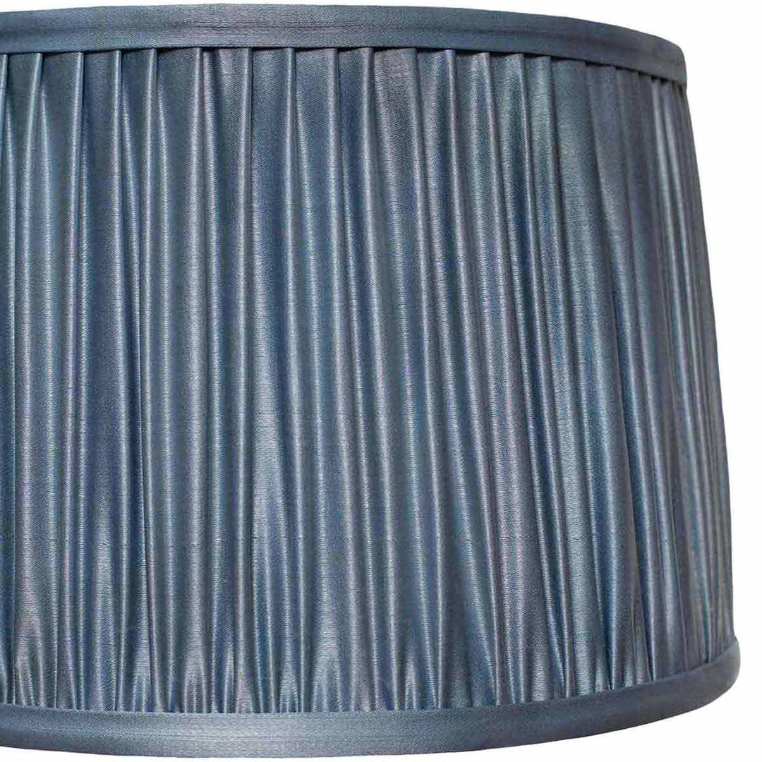 Close-up of Mekhann's grey silk lampshade with intricate ikat design, highlighting artisanal attention to detail.