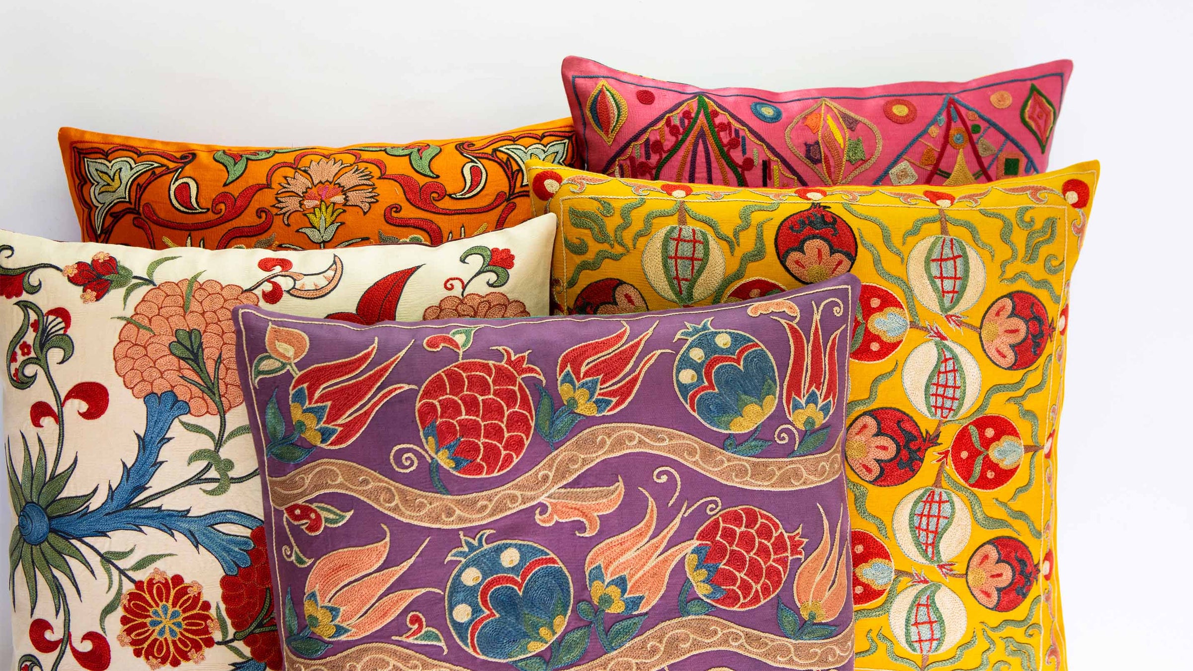 Handcrafted embroidered designer cushions featuring silk embroidery with Ottoman-inspired motifs by Mekhann