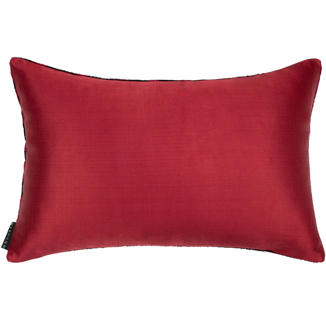 Handwoven pure silk cushion back in deep crimson, offering a smooth, refined contrast to the Sagitta Ikat front—crafted for luxurious versatility
