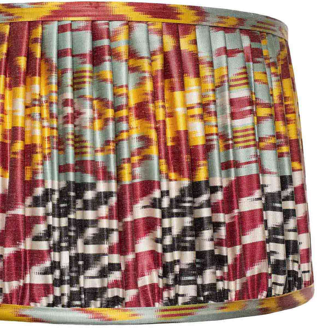 Close-up of Mekhann's ikat lampshade, highlighting the complex multicolour pattern and fine craftsmanship.