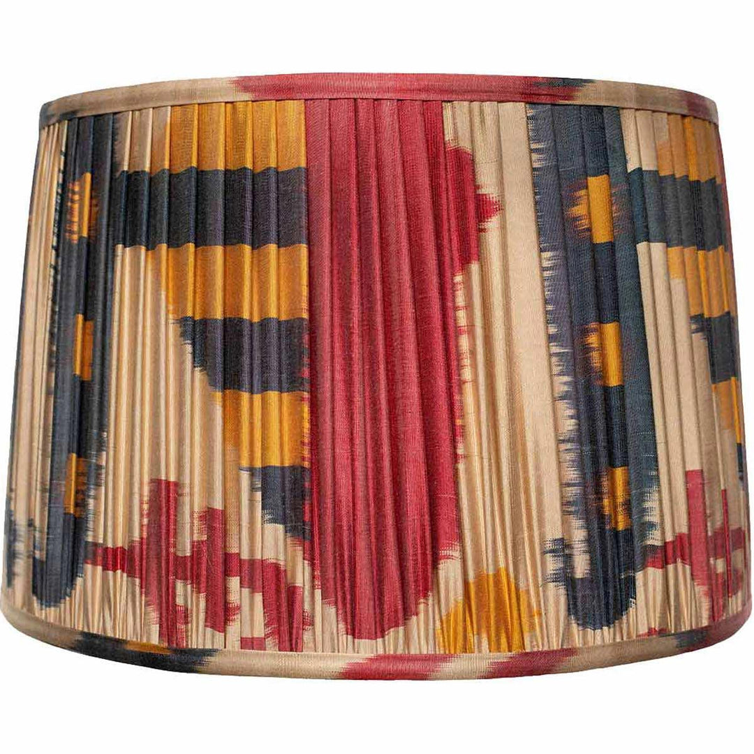 Mekhann's large multicolored silk ikat lampshade, a statement piece with bold, sustainable colours for impactful lighting.