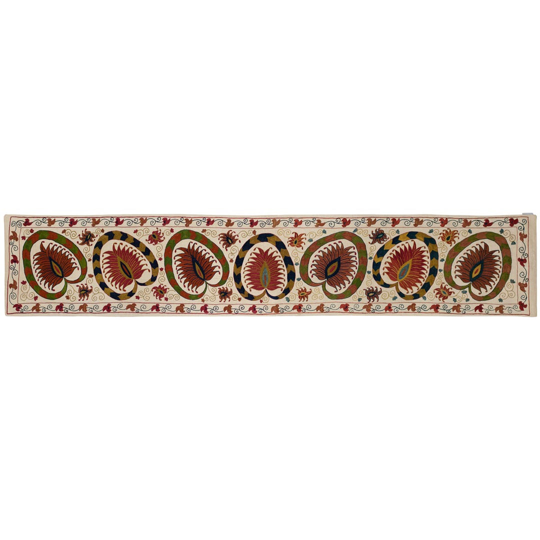 Horizontal front view of Mekhann's cream lotus runner, showing an alternative way the runner can be viewed or placed.