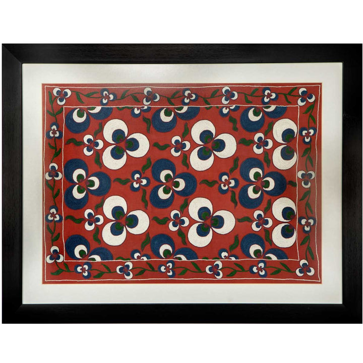 Horizontal front view of Mekhann's maroon silk cintamani artwork, revealing an alternative way of viewing the silk artwork, giving different placement possibilities for the maroon silk artwork.