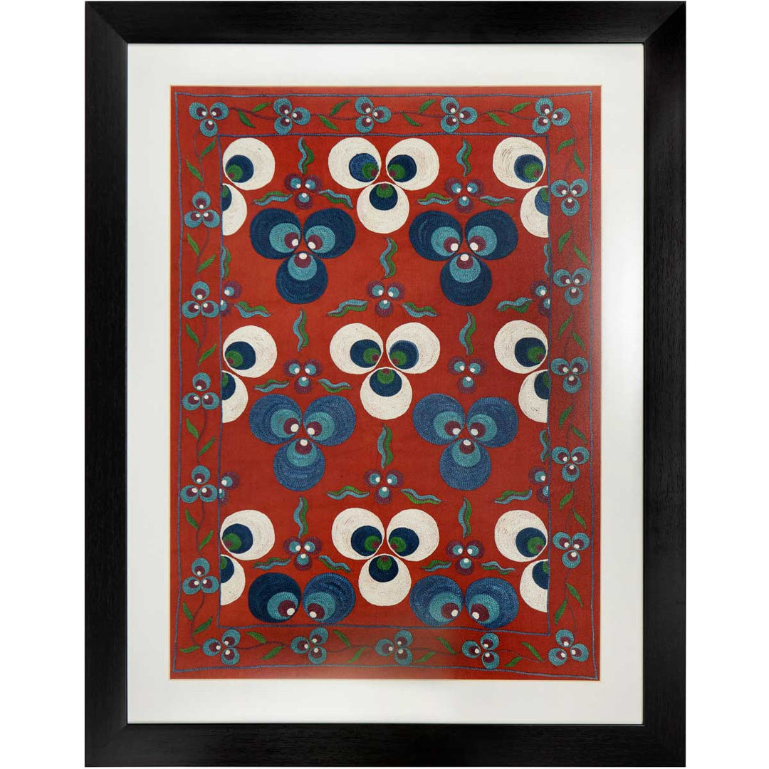 Front view of Mekhann's light maroon silk cintamani artwork, displaying the cream and light blue Cintamani embroidery. All set within a black frame with white space between the artwork and the black frame.