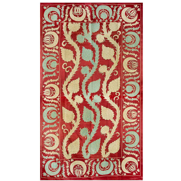 Front view of Mekhann's maroon grape vines throw, displaying the light blue and cream vines embroidered against the vibrant maroon silk backdrop.