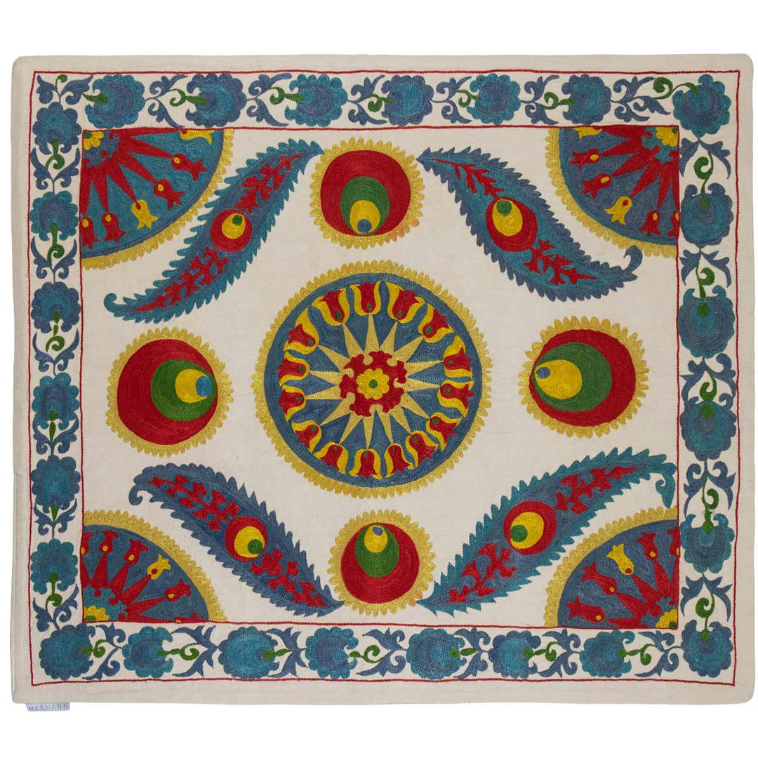 Alternative front view of Mekhann's cream iznik silk petite throw, showing the different way the throw could be positioned in.