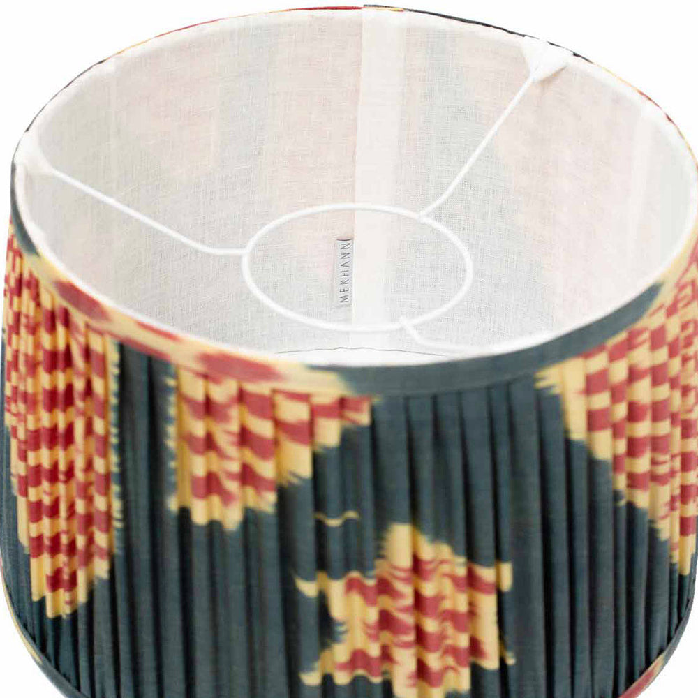 Interior perspective of Mekhann's navy silk lampshade, highlighting the elegant pattern contrast and the quality of silk.