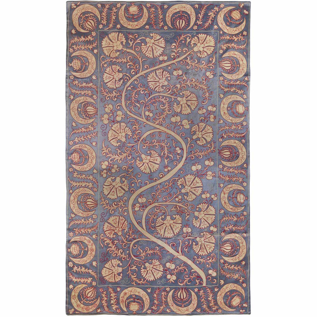 Front view of Mekhann's pewter carnations throw, showcasing the full composition of the throw with a collection of hand embroidered, cream and red, carnation hand embroidery created onto a grey silk canvas.