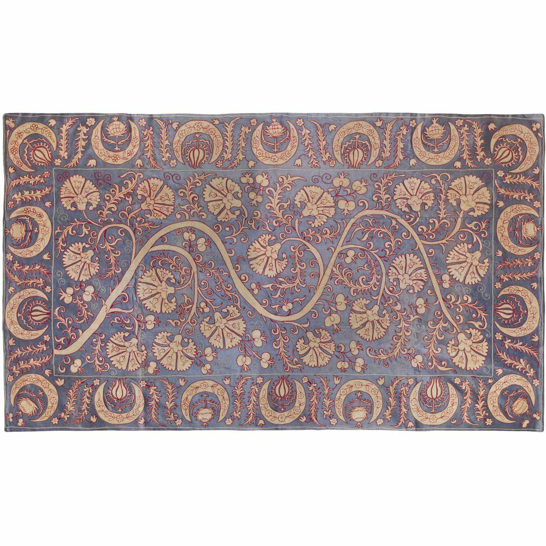 Horizontal front view of Mekhann's pewter carnations throw, displaying an alternative way one can place the throw on any surface.