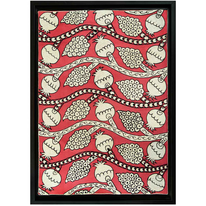 Front view of Mekhann's hand embroidered, pink silk artwork, showcasing vine and pomegranate designs embroidered in cream  with a black outline, set on a base colour of pink silk.