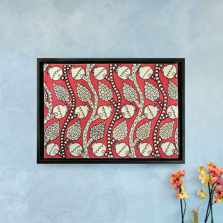 In use view of Mekhann's hand embroidered, pink silk artwork, showing how the frame looks like hung on a wall to give size context.