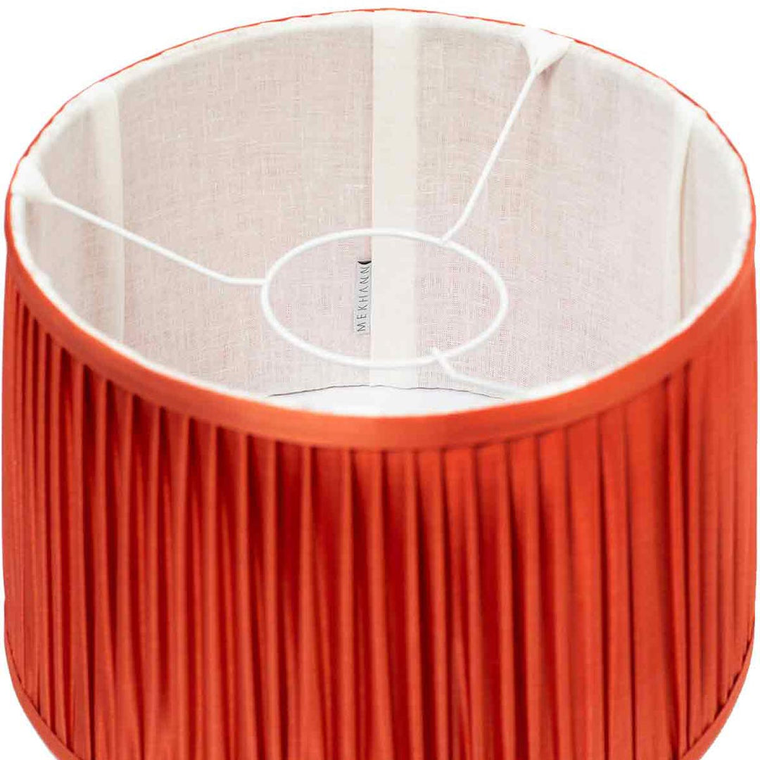 Interior view of Mekhann's red silk pleated lampshade, showcasing exquisite craftsmanship and rich fabric quality.