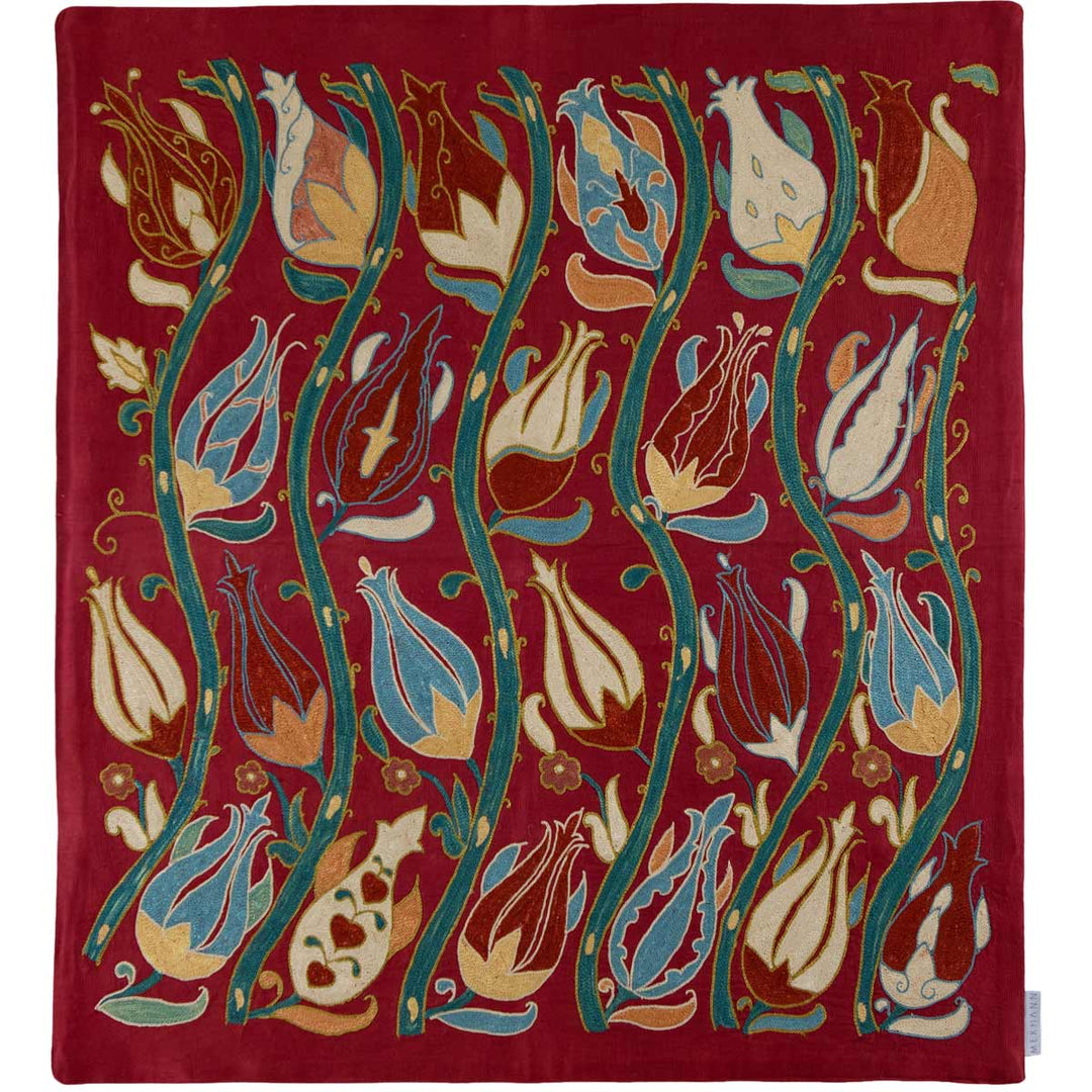 Front view of Mekhann's maroon tulip petite throw, a graceful tulip design in gold and blue embroidery, presented in a full front view. All hand embroidered has been done onto a canvas of maroon coloured silk.