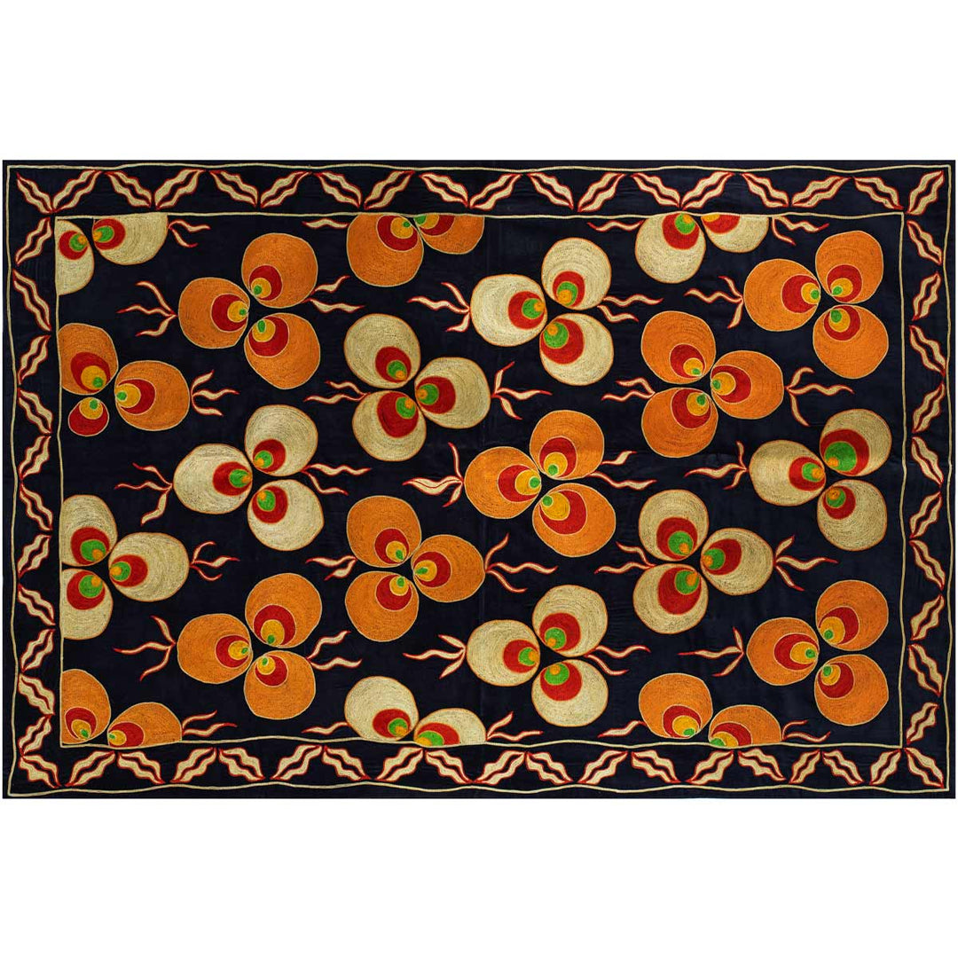 Horizontal view of Mekhann's navy, velvet cintamani throw, Giving an alternative way you can place or view the throw for different settings.