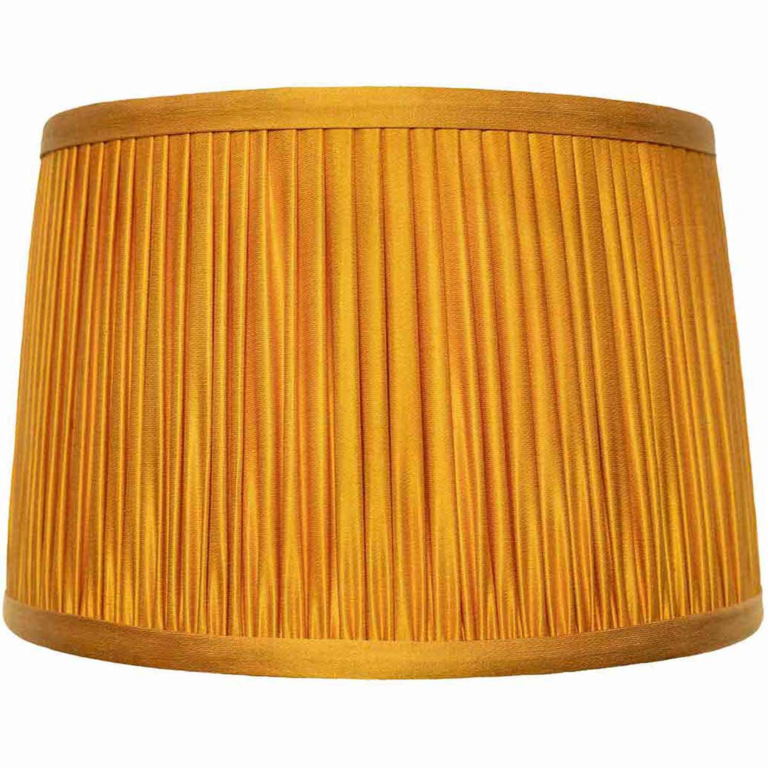 Front view of Mekhann's yellow silk lampshade, highlighting the luxurious sheen and precise pleats.