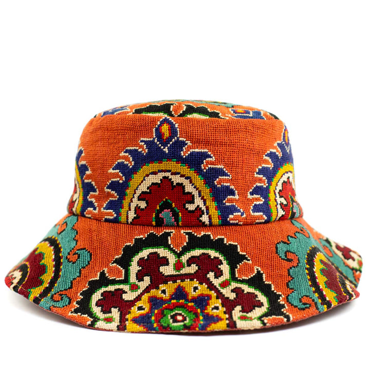 Front view of the arabesque clementine bucket hat, showcasing a delicate range of bright patterns, symbolising Mekhann's attention to detail.