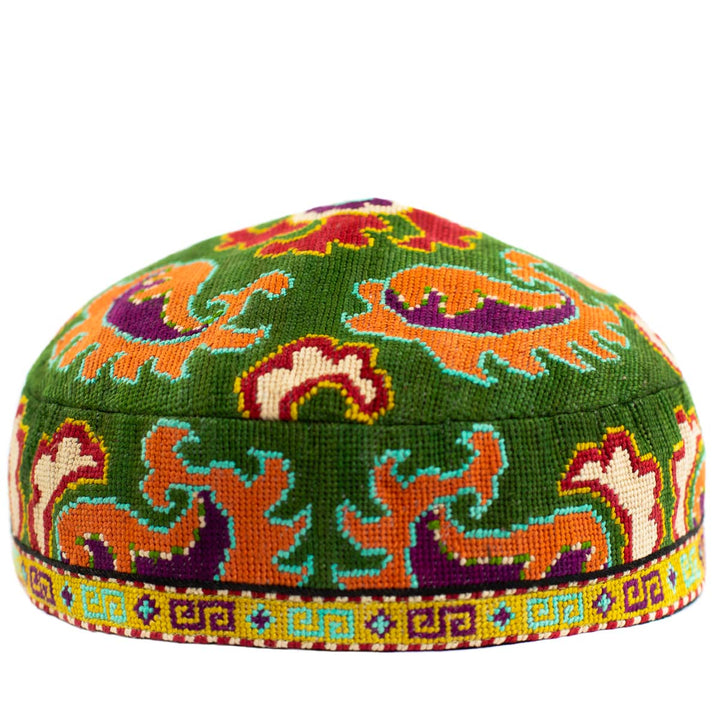 Front view of Mekhann's green arabesque skull cap, a bright display colour and a testament to craftsmanship.