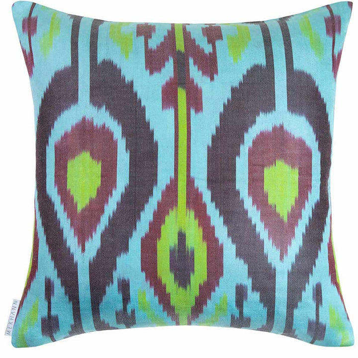 Back view of Mekhann's multicoloured Pomegranates and Tulips embroidered cushion. On the back of the cushion a blue and green toned ikat back lining