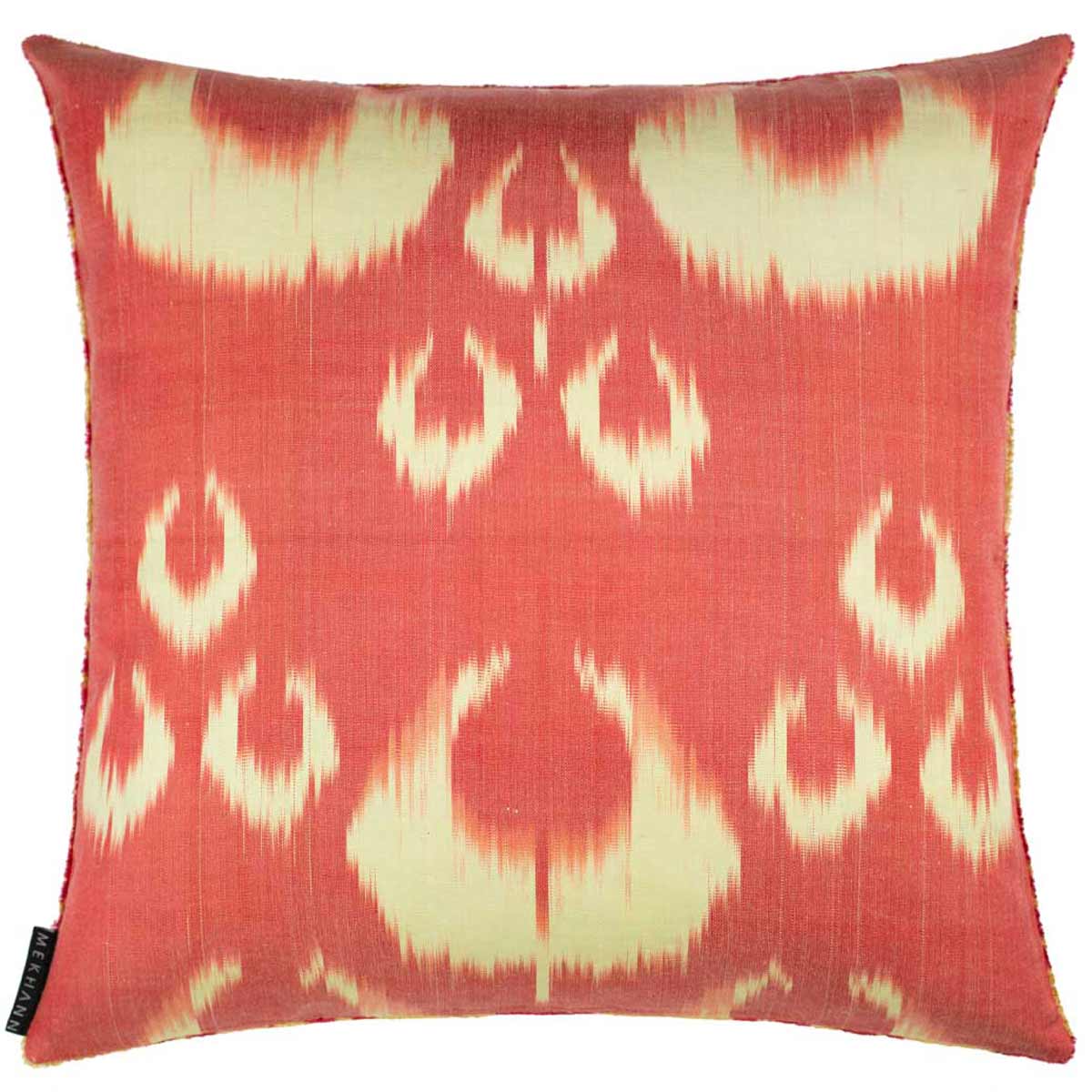 Back view of Mekhann's orange moon velvet cushion, Revealing a orange and cream ikat lining for the back of the velvet cushion.