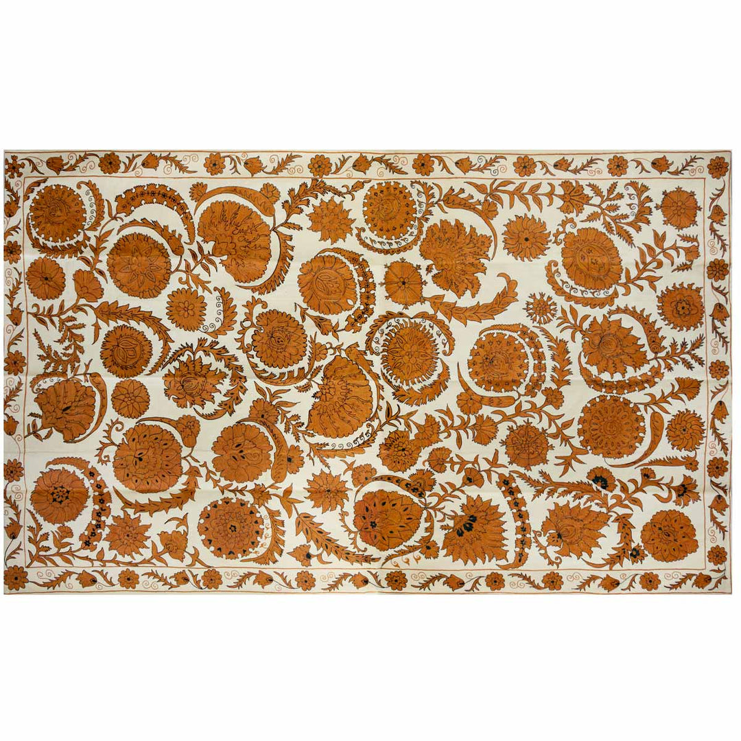 Horizontal front view of Mekhann's caramel botanical throw, displaying a different or alternative way the throw could be positioned onto a surface.