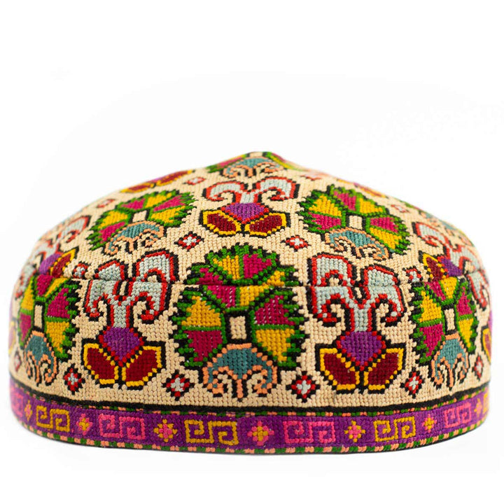 Front view of Mekhann's multicoloured carnations skull cap, showcasing a wonderful collection of hand embroidered carnations patterns on a cream base.