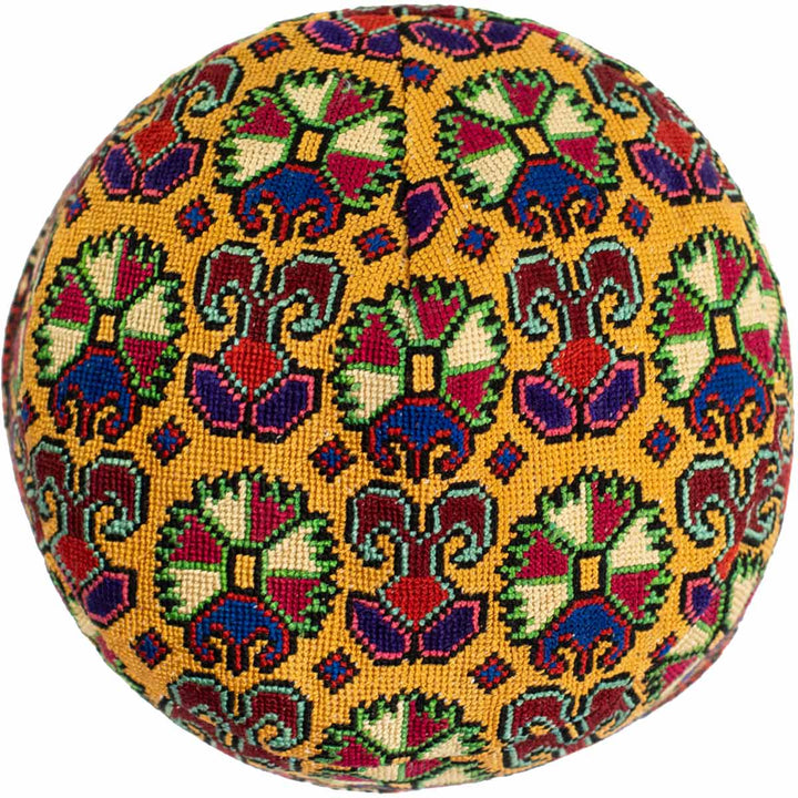 Top view of Mekhann's yellow carnations skull cap, showing the full collection of carnations embroidered patterns.
