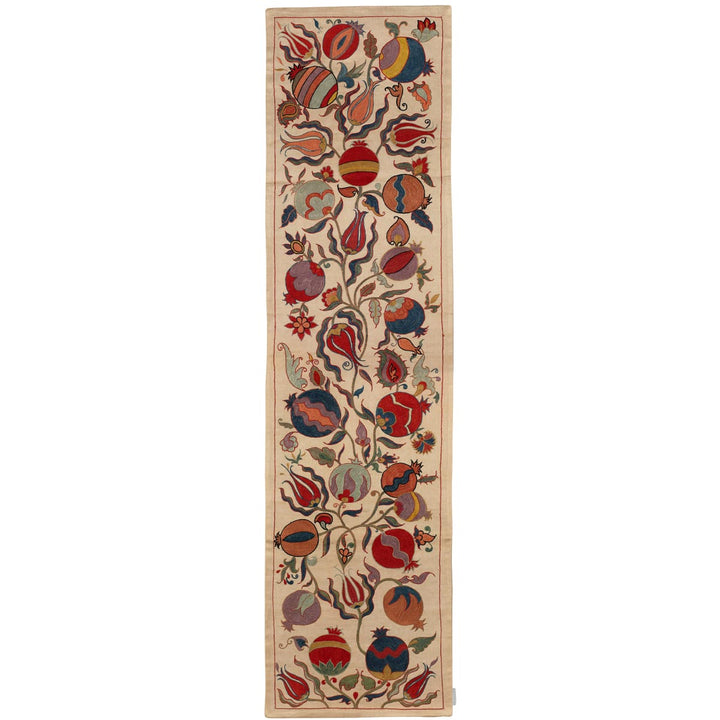 Front view of Mekhann's cream ottoman vines runner, featuring a diverse array of vibrant, traditional vine patterns on a cream coloured silk background.