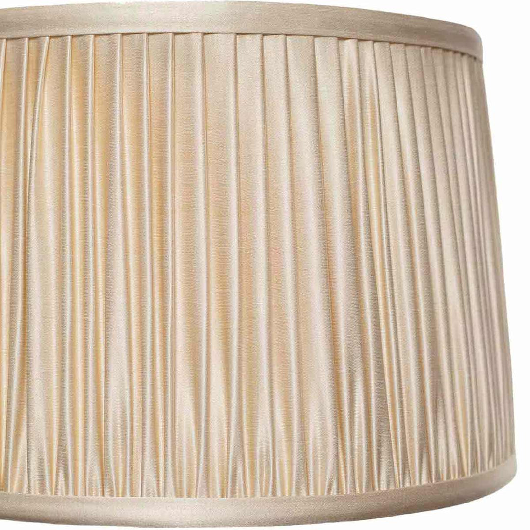 Close-up of Mekhann's cream silk lampshade, showcasing the meticulous hand-pleated craftsmanship and subtle sheen.