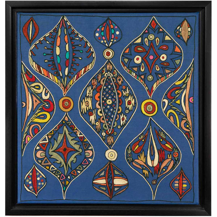 Front view of Mekhann's navy silk hand embroidered artwork, showcasing a contemporary collection of shapes in the colours yellow, cream, green, and red with black outlines.
