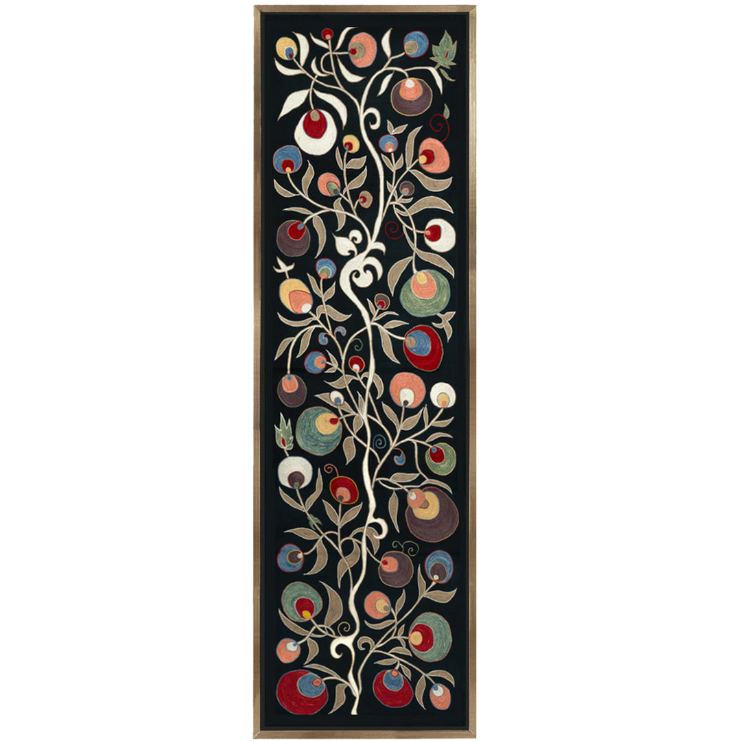 Front view of Mekhann's black pomegranate silk artwork, show casing a vines design with colourful pomegranate embroidered in reds, greens, yellows and blues, on a base of black silk. All within a metallic frame.