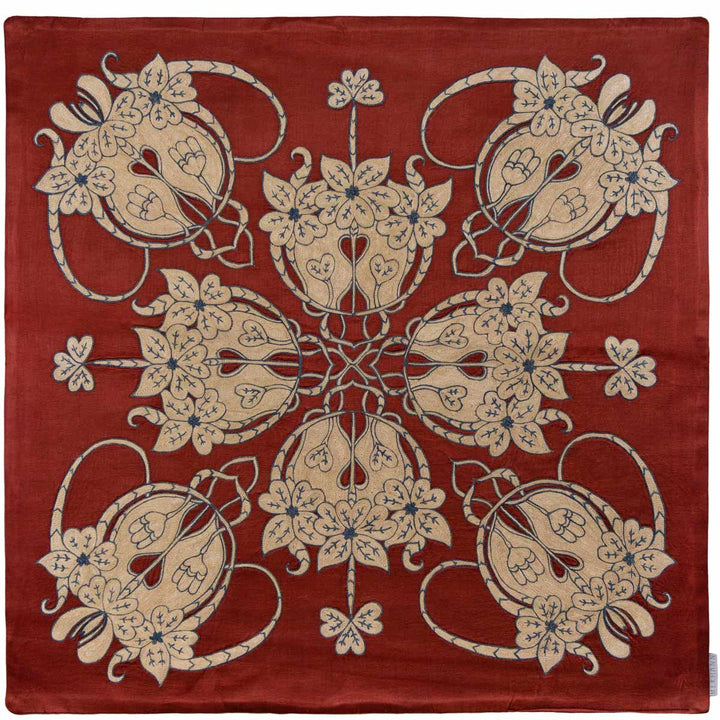 Front view of Mekhann's maroon baroque petite throw, featuring intricate cream embroidery in a classic baroque pattern, displayed in full view on a silk maroon base.
