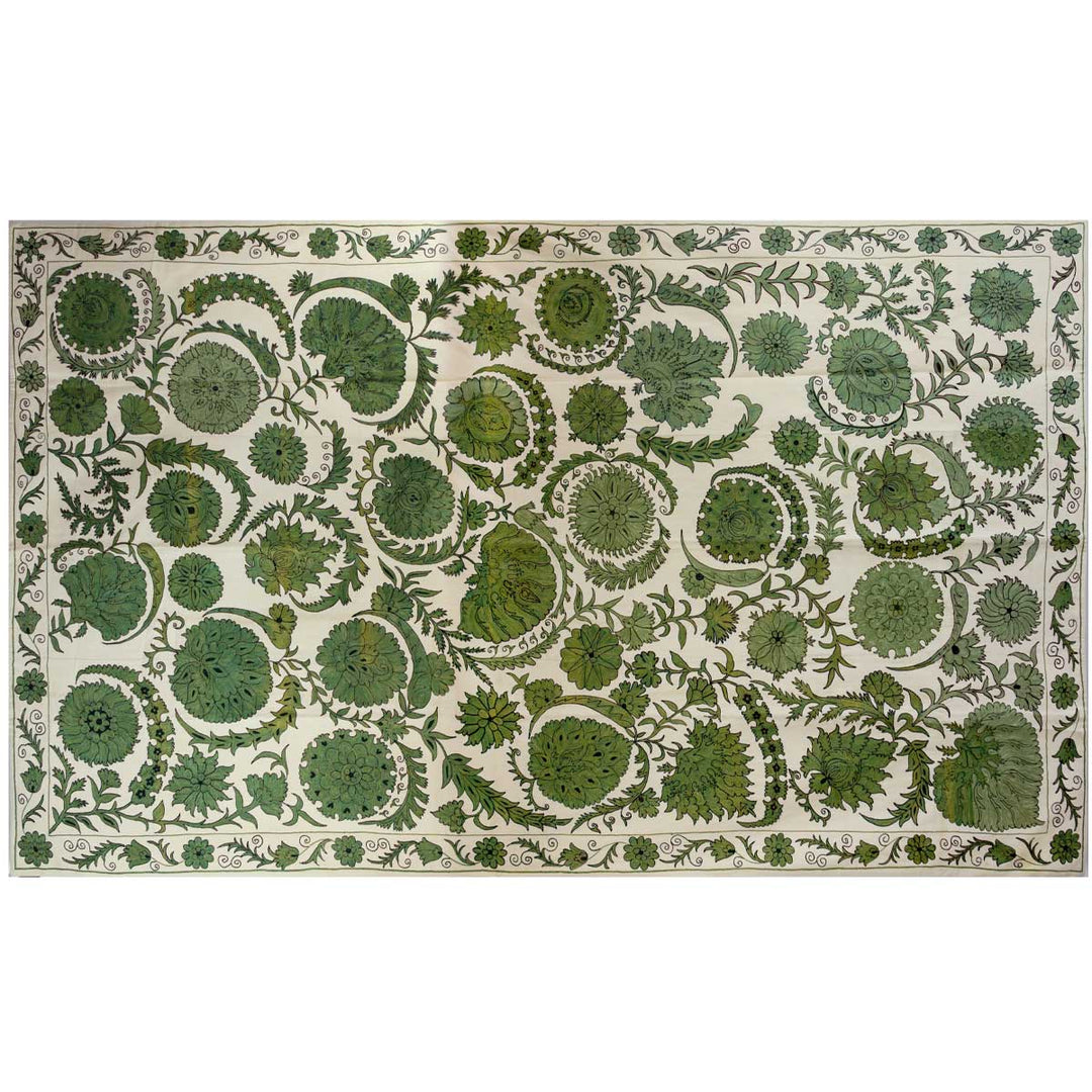Horizontal front view of Mekhann's emerald botanical throw, showing how the throw would look like when rotated horizontally, to give an idea to buyers of different ways to use it.