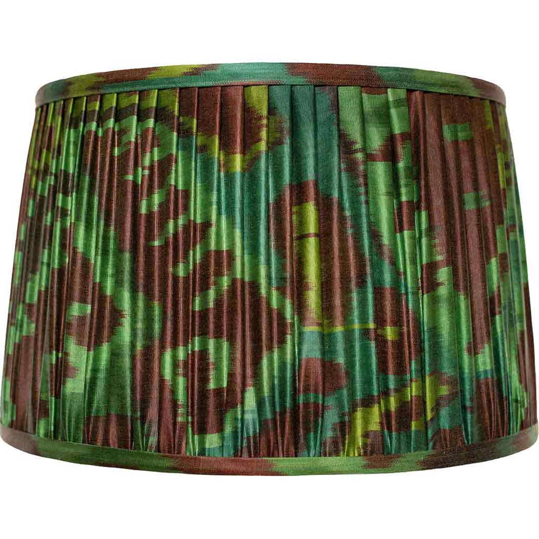 Front view of Mekhann's emerald and brown ikat silk lampshade, hand-pleated and dyed with natural vegetable dyes.