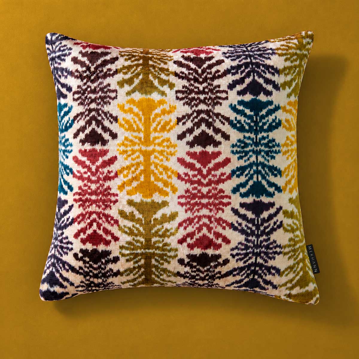 frond-velvet-ikat-cushion-ivory-saffron-front-mekhann.jpg
Front view of the Frond Cushion in Ivory against a saffron-yellow background. 